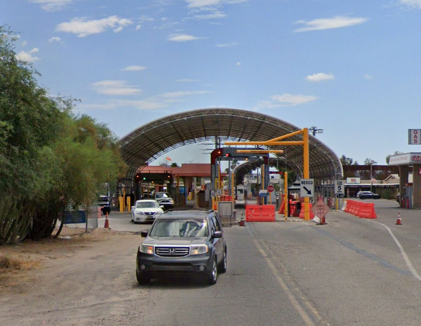 Vehicles at the U.S.–Mexico border crossing checkpoint